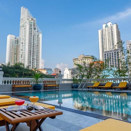 Nh Bangkok Sukhumvit Boulevard Buitenkant foto The swimming pool at the hotel