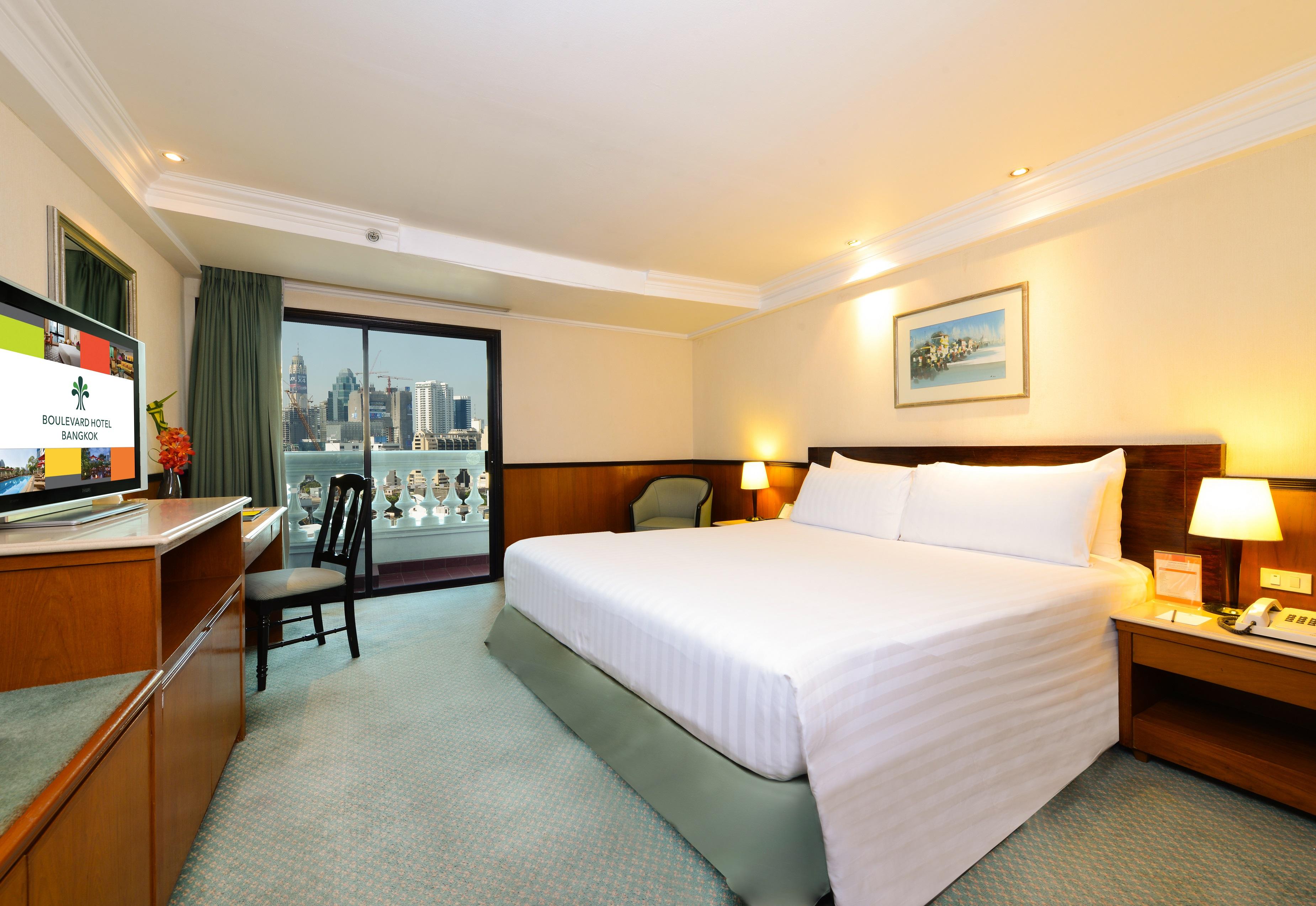 Nh Bangkok Sukhumvit Boulevard Buitenkant foto Deluxe Room