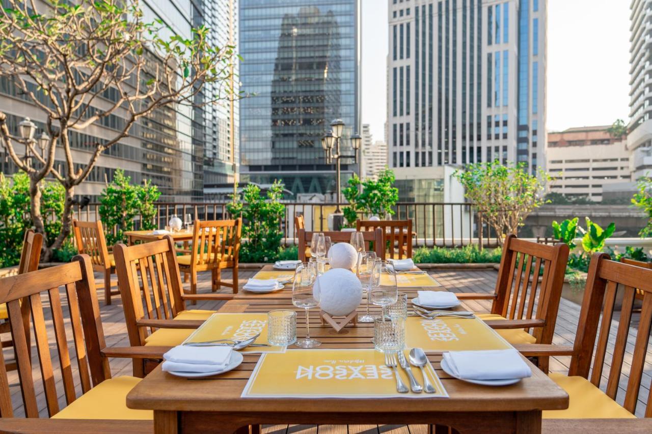 Nh Bangkok Sukhumvit Boulevard Buitenkant foto The outdoor dining area at the restaurant