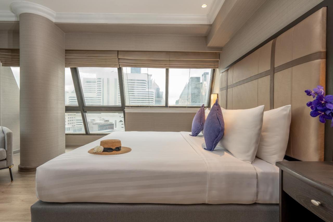 Nh Bangkok Sukhumvit Boulevard Buitenkant foto A bedroom at the hotel