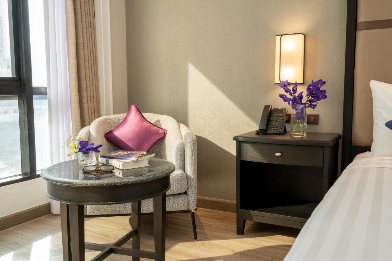 Nh Bangkok Sukhumvit Boulevard Buitenkant foto A room at the hotel
